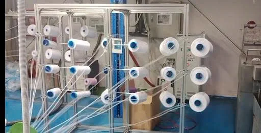 ระบบป้อนเส้นใยม็อบอัตโนมัติ