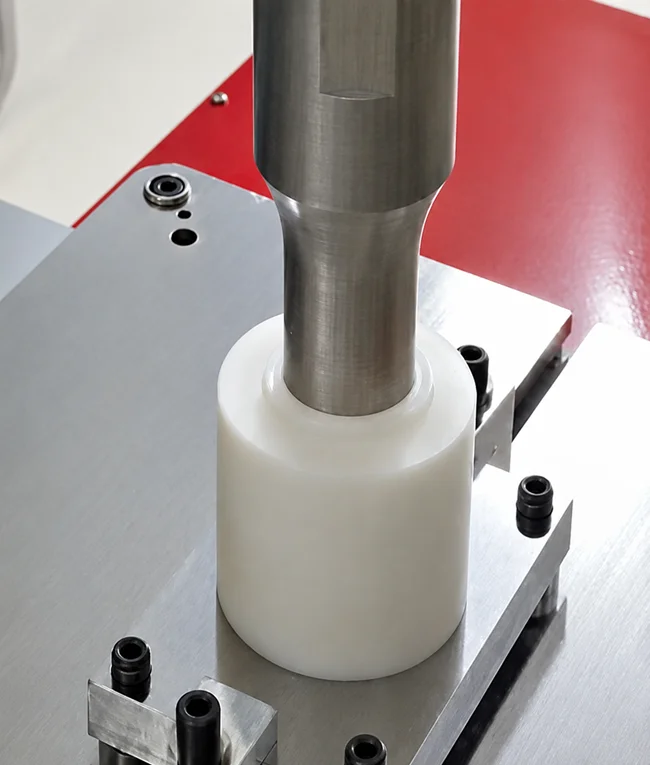Ultrasonic welding horn contacting the water filter cartridge cap