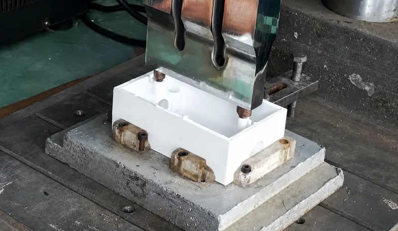 Ultrasonic welding machine inserting metal threaded inserts into ABS plastic