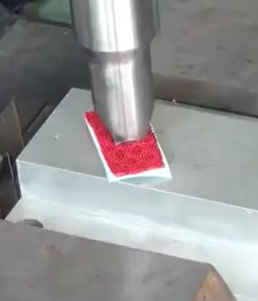 Red textured surface material sample welded by ultrasonic technology