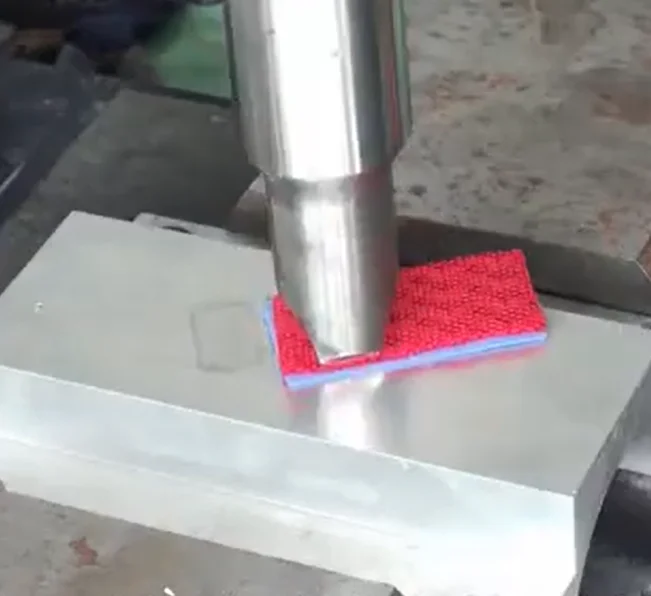 Long red strip material sample welded by ultrasonic technology