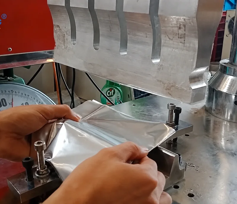 Ultrasonic welding of aluminum-coated laminated film on a multifunctional vertical welding machine by VietSonic