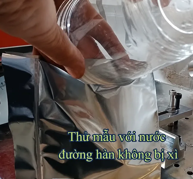Testing an ultrasonic weld sample with water