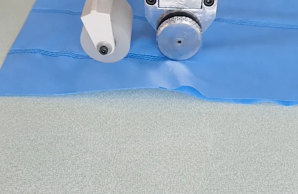 Ultrasonic welding of nonwoven fabric
