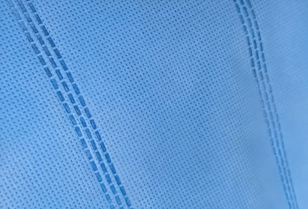 Thread-free weld seam on nonwoven fabric