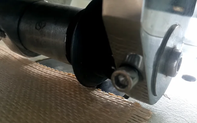 Ultrasonic sewing machine processing a PP bag